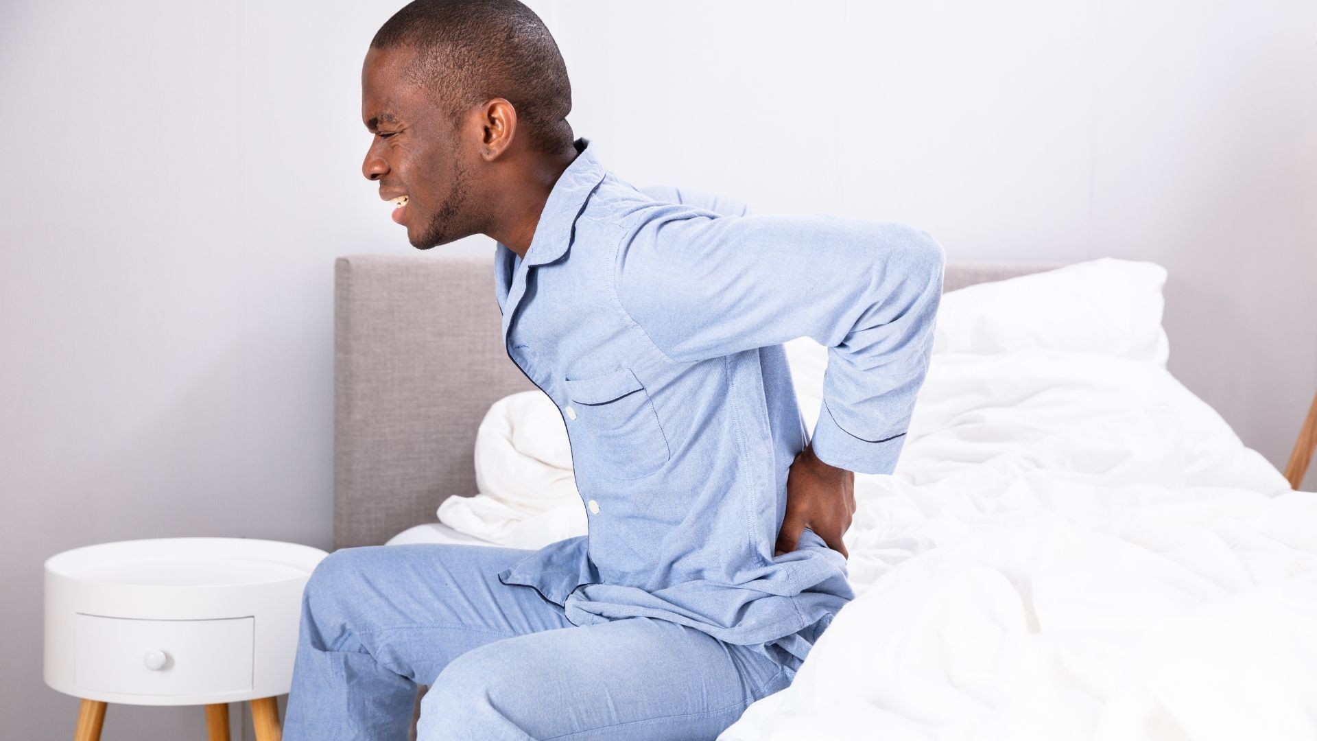 Lower Back Pain When Lying Flat On The Floor? Back In Shape