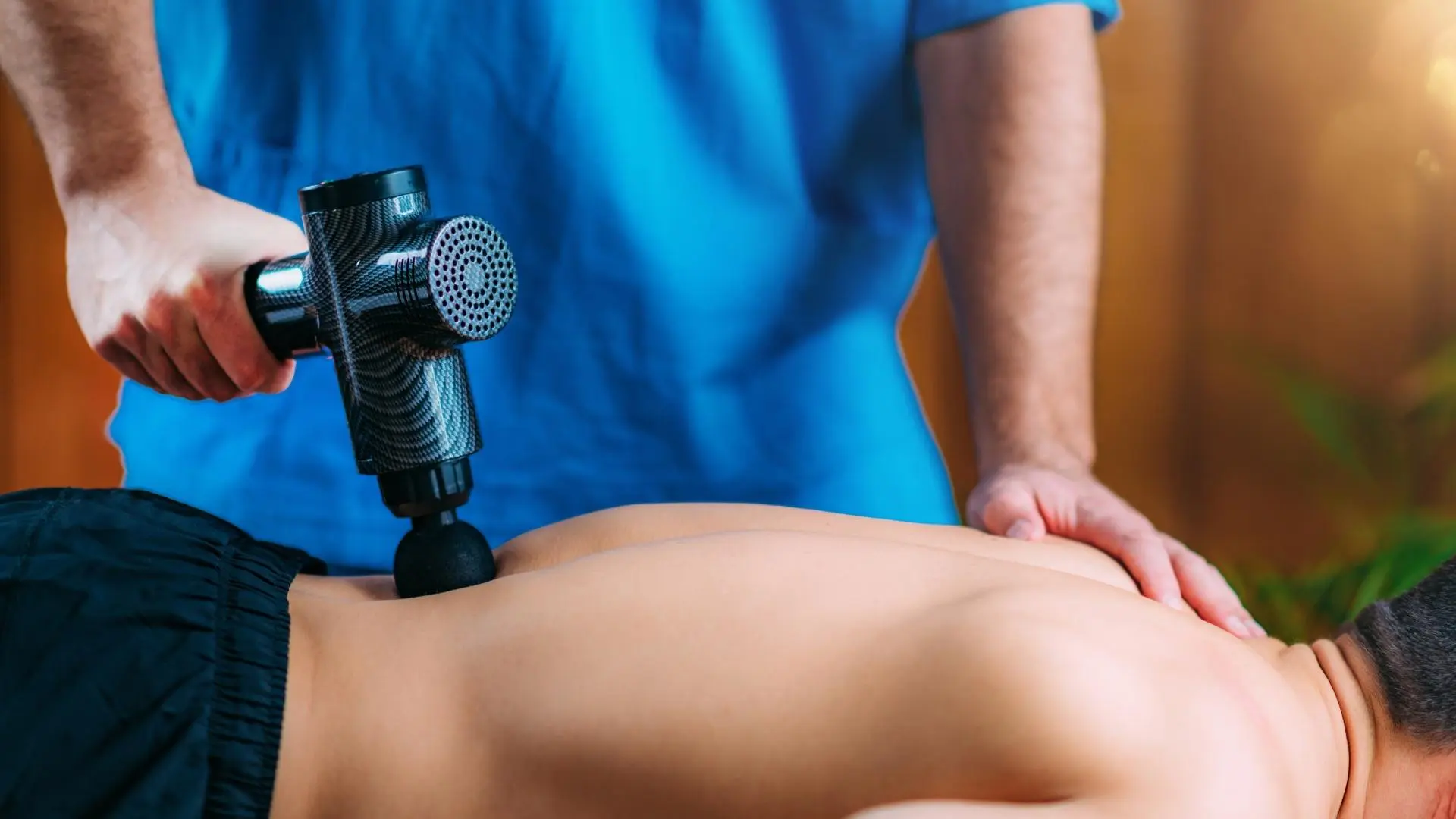 What a Massage Gun Does for Back Pain